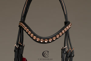 IRNHAM - Black snaffle bridle with drop noseband, rose gold piping and rose gold fittings