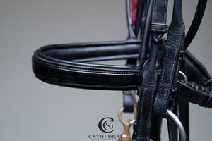 STENIGOT Snaffle Rolled Bridle With Cavesson Patent Noseband & Plain Rolled Browband With Rolled Leather Reins
