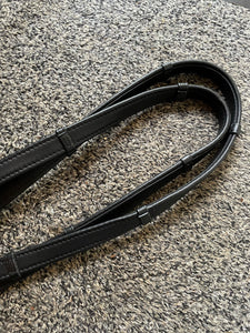 Soft padded leather rolled reins with continental notches